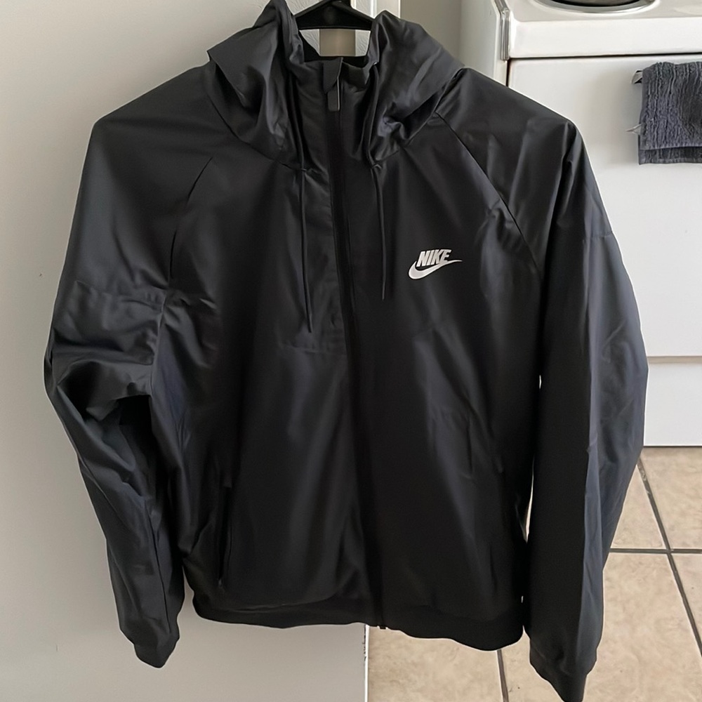 NIKE Rain Zip-Up Jacket with hood. It is in perfect condition m. Worn once